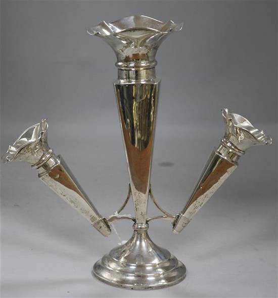 A George V silver epergne having three tapered vases with shaped everted rims (weighted), Sheffield 1917, James Deakin & Sons